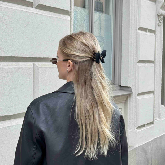 Hårklämma fjäril, Svart